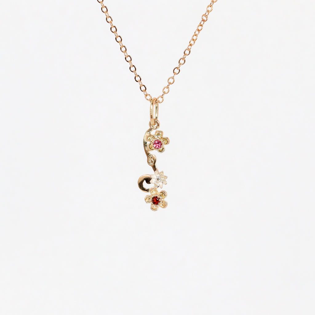 Leon Baker – 9KYG & Silver Wildflower Garnet & Pink Sapphire Pendant