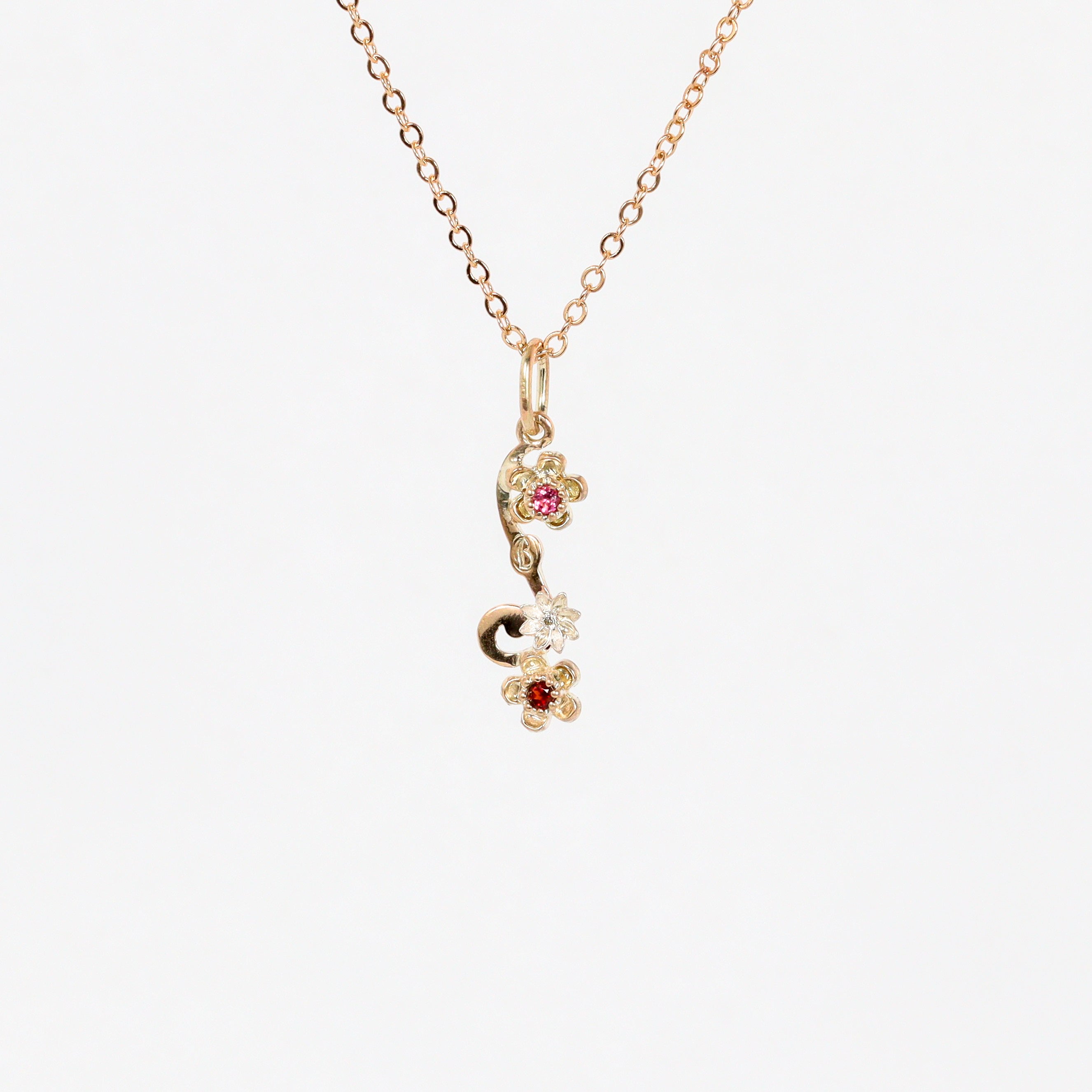 Leon Baker – 9KYG & Silver Wildflower Garnet & Pink Sapphire Pendant